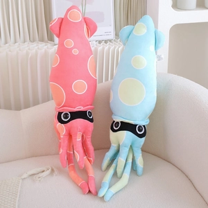 Close-up of colorful squid plush pillows in soft fabric on a minimalist cozy sofa