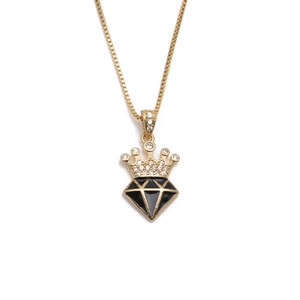 Gold crown pendant necklace with black enamel and zircon accents on white background