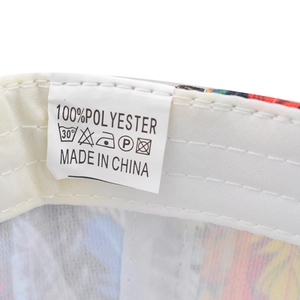 Close-up of baseball cap interior with 100% polyester wash label and clean stitching
