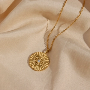 18K gold plated stainless steel starburst pendant necklace with sparkling crystal