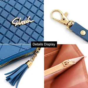 Blue embossed leather long wallet for women featuring golden Salred logo and tassel zip
