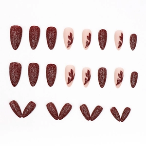 Red velvet frosted almond press-on nails with silver glitter and leaf pattern design