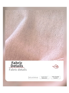 Macro shot of soft pink pure cashmere scarf with fine ripple texture and thermal weave