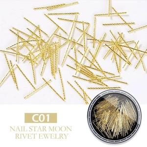 Macro shot of gold metal nail art strips C01 for star and moon rivet decoration