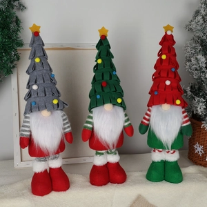 Three long-legged Christmas gnomes in grey, green and red for Nordic home decor