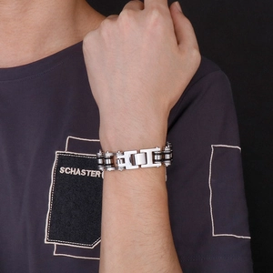 Close-up of a men's punk style 304 stainless steel biker chain bracelet in silver and black