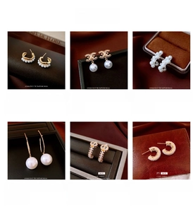 Detail of luxury 18k gold plated pearl earrings in various retro C-shape designs