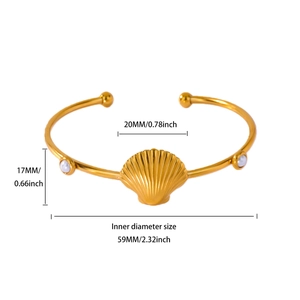 Detailed dimensions of gold starfish cuff bracelet with shell and white pearls