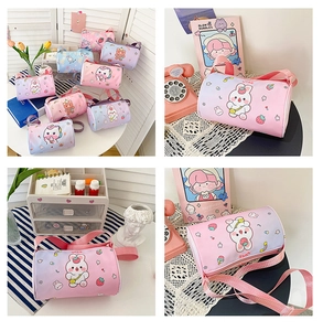 Detail view of colorful cartoon cylinder canvas bags for girls with adjustable straps