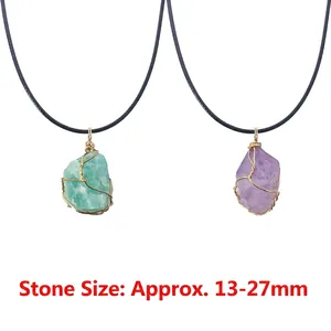 Handmade wire-wrapped natural crystal pendant necklaces in green and purple stones