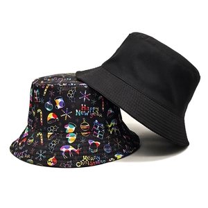 Reversible bucket hat set with minimalist black and festive Christmas patterns