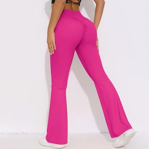 Detail view of high waist rose red yoga pants with back ruching for lifting effects