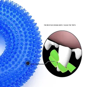 Blue ring-shaped TPR dog chew toy with spiked bristles for deep dental cleaning