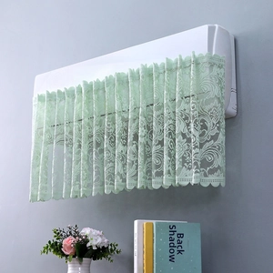 Detailed close-up of light green lace texture on a breathable air conditioner dust cover