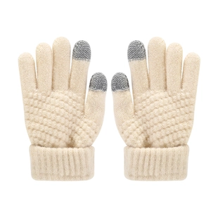 Close-up of beige knitted gloves with grey touch-screen fingertips and textured palms