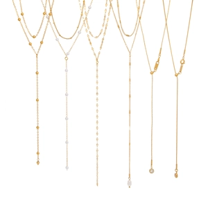 Elegant gold double-layered Y-shaped chain necklaces with pearls on white background