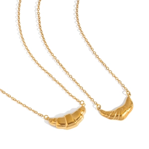 Elegant gold croissant pendant necklaces with minimalist geometric design on white background