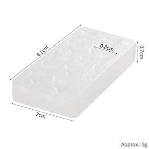 Detail view of silicone mold with star and moon patterns including product dimensions