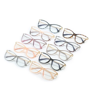 Detailed overhead view of cat-eye TR90 glasses frames in various colors with metal temples