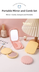 Detail view of cookie shaped portable mirror with comb set in soft pastel colors