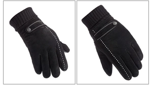 Detail of black pigskin gloves with knit cuffs, decorative buckles, and white contrast stitching
