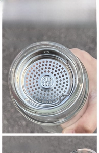 Detail view of SUS 304 stainless steel tea filter and secure lock on water bottle lid