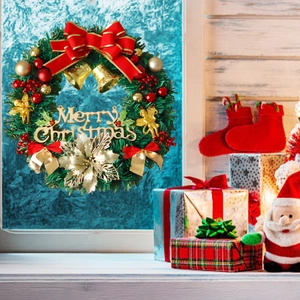 Christmas wreath window sticker with gold Merry Christmas lettering and festive ornaments