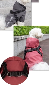 Detail of waterproof dog raincoat with integrated harness and durable metal D-ring buckle