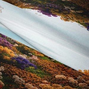 Macro shot of colorful floral meadow print on soft velvet tapestry fabric texture