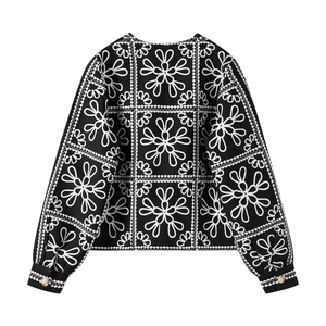 Women's black and white floral embroidery long sleeve top and shorts set back view