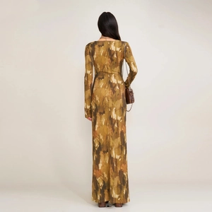 Back view of slim fit long sleeve maxi dress with vintage abstract distressed print