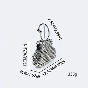 Detail view of silver beaded shell bag with dimensions 17.5cm width and 12cm height