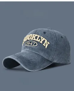 Detail of Brooklyn 1947 3D embroidery on washed cotton vintage baseball cap texture