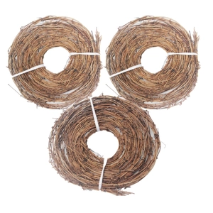 Three natural brown wicker wreaths set for rustic wedding and Christmas home decorations
