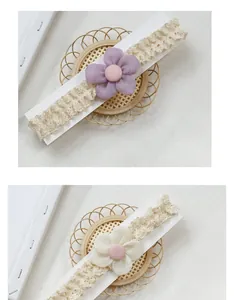 Detailed view of handmade lavender and beige lace headbands with delicate fabric flowers