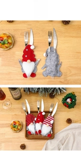 Detailansicht der Weihnachts-Gnom-Besteckhalter mit roten Strickmützen und weißen Bärten