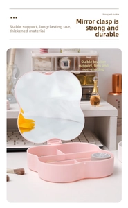 Macro detail of pink flower-shaped organizer with mirror and three storage compartments