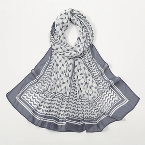 Detail of grey and white checkered chiffon scarf showing light breathable fabric texture