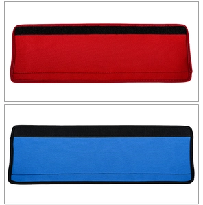 Detailed view of red and blue fabric handle covers with non-slip velvet texture finish