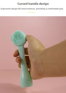 Ergonomic silicone facial cleanser brush with curved handle and soft massage bristles
