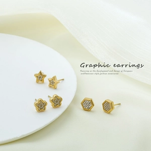 Set of gold-plated star and flower stud earrings with shimmering pave-set zircon stones