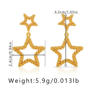 Detailed view of 18K gold star earrings with 4.2cm height and frosted texture detail