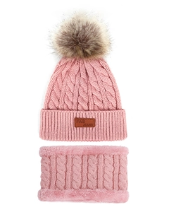 Detail of pink cable knit hat and matching neck warmer with soft faux fur lining