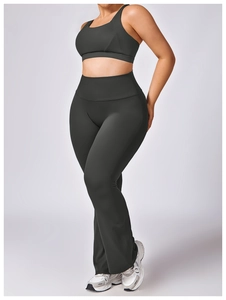 Women's dark gray high-waisted flared yoga set with quick-dry compression fabric