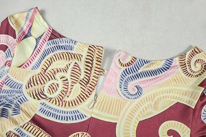 Close-up of the round neckline and hidden zipper on the multicolor printed bodysuit
