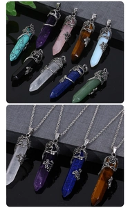 Detailed collection of hexagonal crystal point necklaces with vintage floral metal wraps