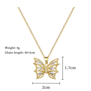 Détails des dimensions d'un pendentif papillon doré en titane serti de zircons