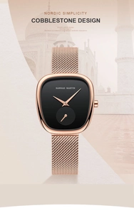 Detail von Roségold-Meshband und minimalem schwarzem Zifferblatt einer Damenarmbanduhr