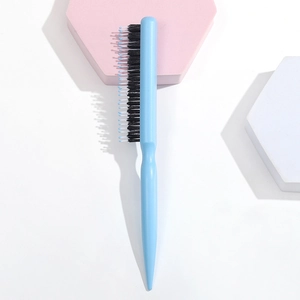 Sky blue hair styling brush with three rows of bristles and pointed tail handle