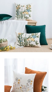 Detail of embroidered floral canvas and velvet throw pillows in various colors and sizes